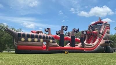 Pirate ship inflatable obstacle course rental Austin TX - Jump Around Party Rentals large event